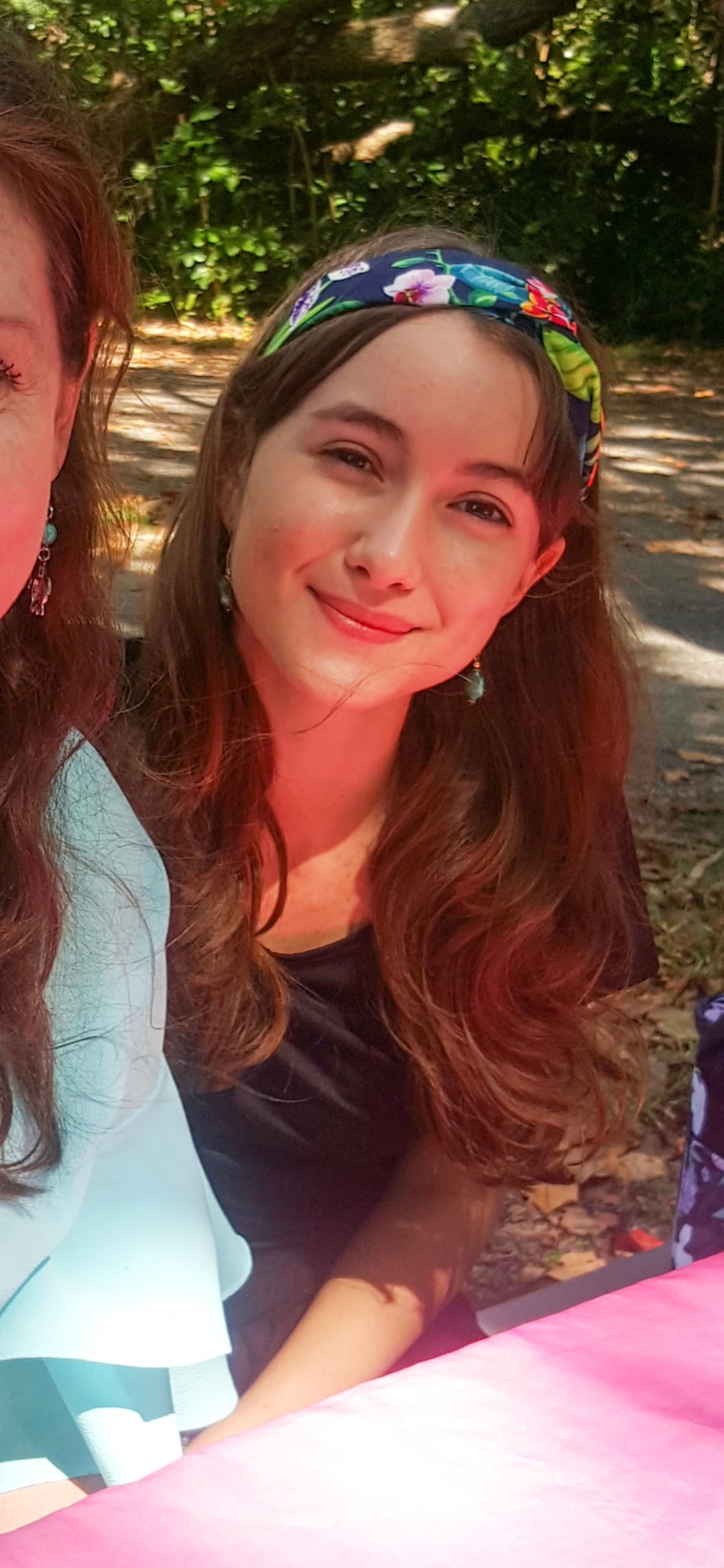 Elvira at an outdoor group gathering